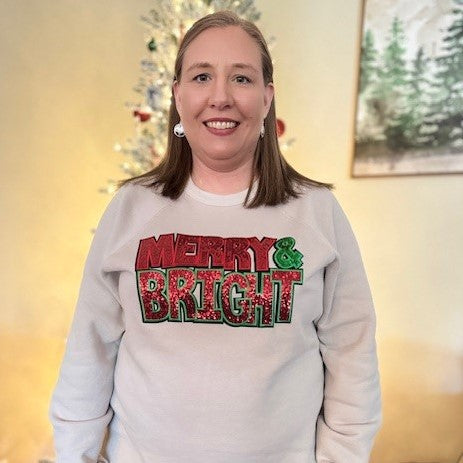 Spread Holiday Cheer with our Merry and Bright Crewneck Sweatshirt!